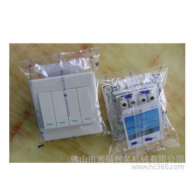 供應配件包裝機,宏碩包裝機,扣具勾扣包裝機,扣具包裝機,宏碩電器配件包裝機