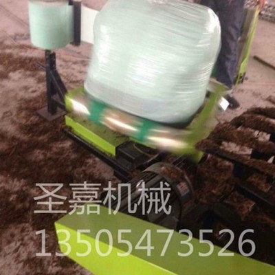 新型圓捆飼料打捆包膜機(jī)圖片 山東 青貯飼料面包機(jī)哪個(gè)牌子好